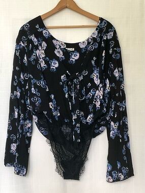 Free People black and purple floral bell sleeve bodysuit with front tie